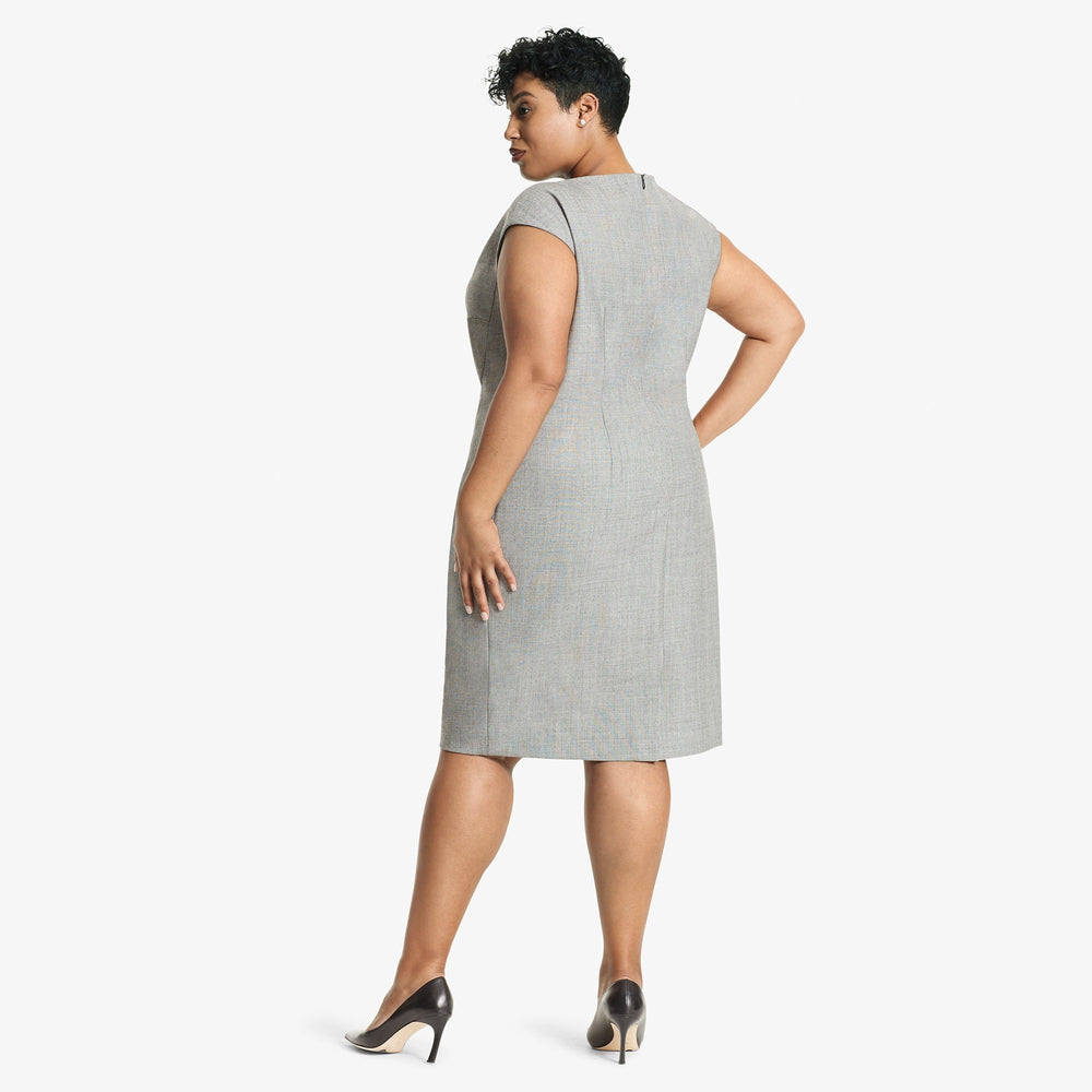Back image of a woman standing wearing the Marilyn Dress Sharkskin in Black and White