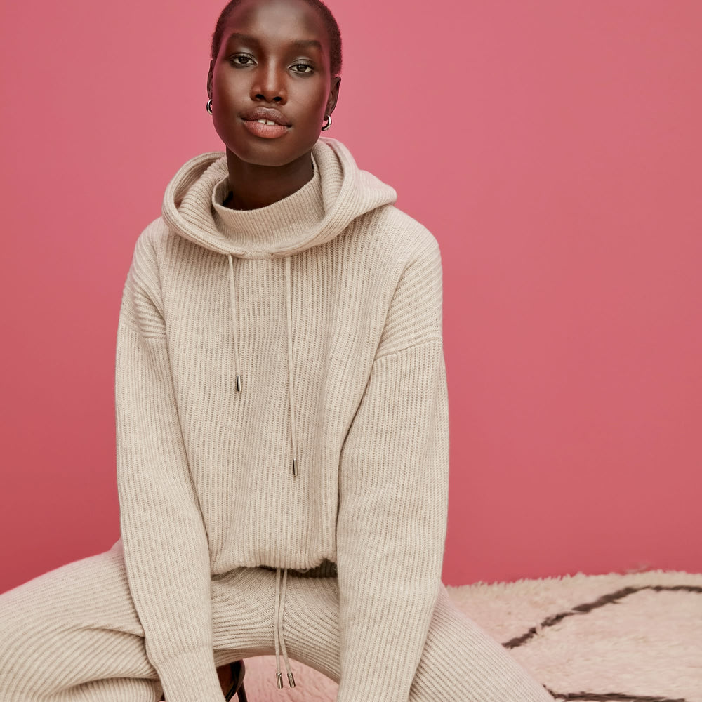 Front image of a woman standing wearing the Addison Jogger—Cashmere/Wool in Oatmeal Melange