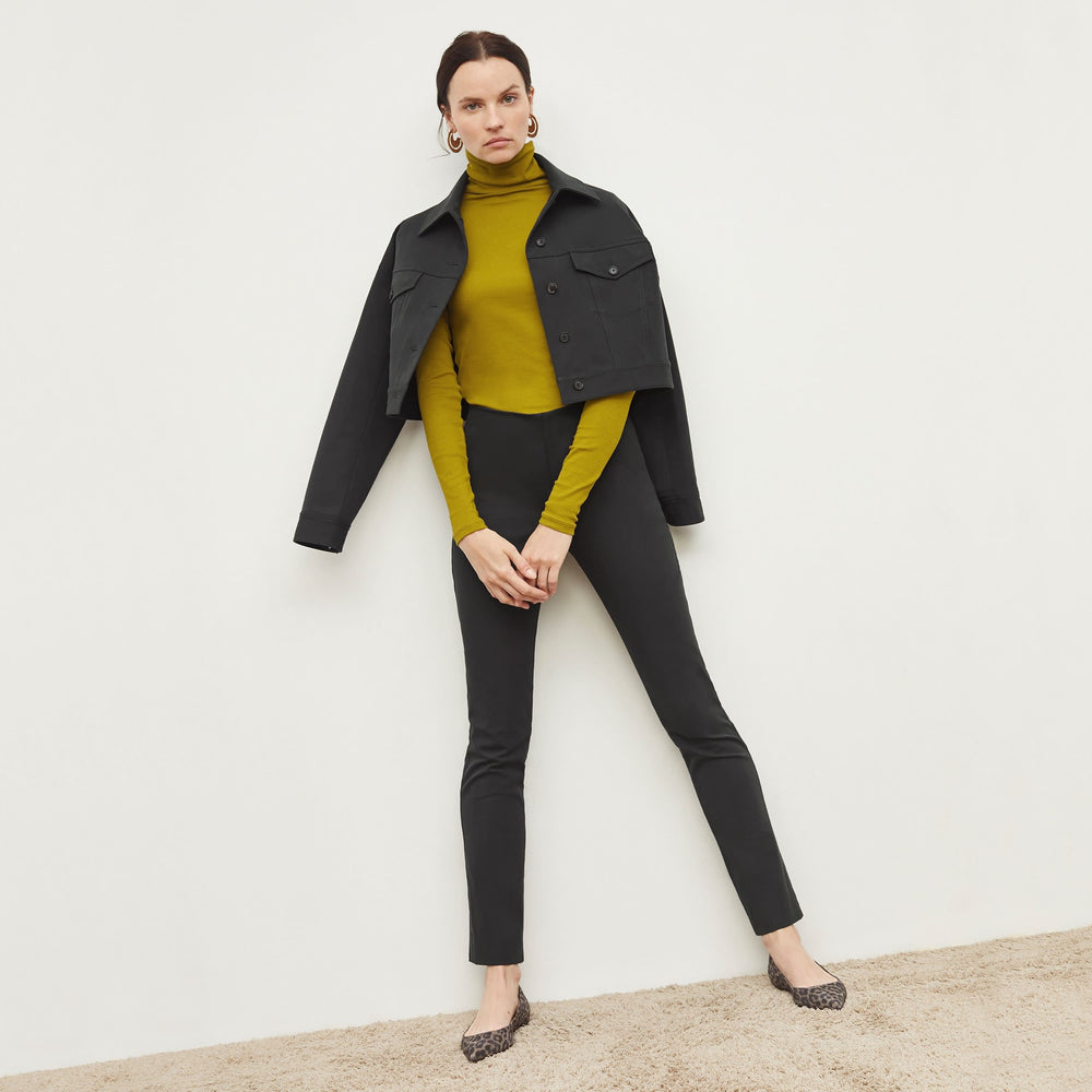 Front image of a woman standing wearing the Hockley Jean in Hemlock