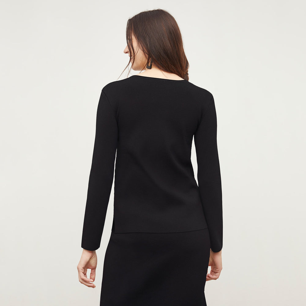 Back image of a woman standing wearing the Malin Top—Jardigan Knit in Black